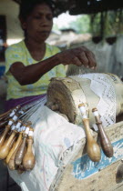 Woman making lace in a workshop