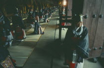 Chong Myo temple with men takingpart in Confucian rites ceremony Confucianism