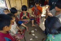 Lahu children playing cards.