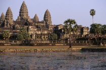 The central complex seen across the water lilly pond Asian Cambodian Kampuchea Religion Southeast Asia History Kamphuchea Religious