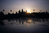 The central complex seen across the water lilly pond at sunrise Asian Cambodian Kampuchea Religion Southeast Asia History Kamphuchea Religious