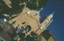 Tourists outside an Felipe de Neri church in the old town plaza