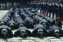 Ching Myo Temple Confucian rites ceremony with worshippers prostrating to the ground.   Confucianism