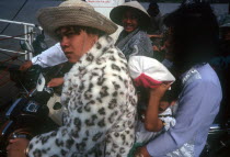 Passengers sitting on motorbikes on a Mekong  ferry