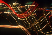 Abstract view of coloured light trails at  night.