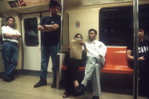 Passengers on board a Mass Rapid Transport or MRT train.