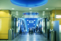 MRT station interior  looking towards the escalators.