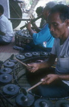 Group of musicians playing traditional instruments.