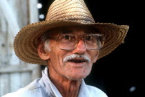 Portrait of a farmer in a straw hat