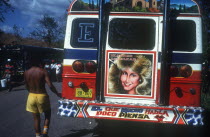 Customised Bus brightly painted with portrait on the back