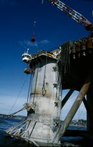 Billy Pugh. Crew embarking on to the platform from a crane