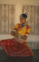 Clasical Indian dancer performing Odissi Temple style dance.