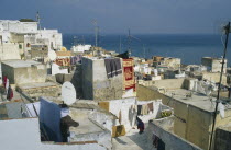 View over rooftops with satelite dishes visible