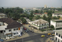 View over road junction in the town with the docks in the distance.