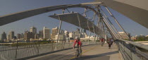 Cyclists and pedestrians crossing the Goodwill Bridge.