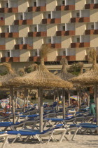 Sun loungers and parasols on the beach at Palma Nova.Mallorca