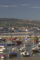 View of the town across the harbour from The Cobb.