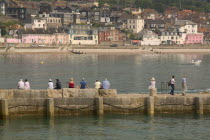 View of the town across the harbour from The Cobb.