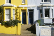 Brightly coloured terraced houses in Kemp Town