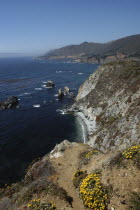 Pacific Coast Highway. View along coastal cliffs with rocky outcrops