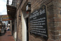 French Quarter. Sign on the wall outside the Original Old Absinthe Bar