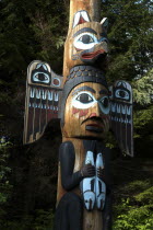 Detail of carved wooden Totem pole in the Totem Park