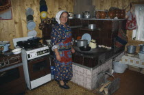 Hutsul woman in kitchen.