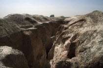 Landrover on ridge of land above old gold workings.mine  West Africa