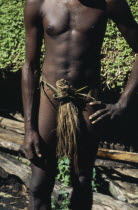 Tanna.  The Nambas.  Cropped shot of tribesman wearing penis sheath.