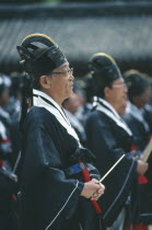 Men attending Confucian rites.