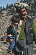 Portrait of Jaji tribesman and son.  The Jaji are one of the Pathan tribes who also inhabit Western Pakistan and formed the power base of the Taliban.Pashtun