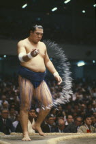 Sumo wrestler throwing salt