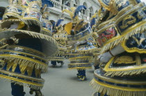 Dancers in costume in carnival procession.