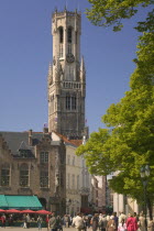 View of the Belfort from the Burg  people walking in the street.Travel  Tourism  Holidays  Icon  Flemish Region