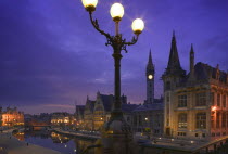 View at night of the medieval core of the city over the Leie River from St Michielsbrug  St Michiels Bridge.Travel  Holidays  Tourism  Flemish Region