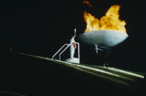 Helen Sharman lighting flame at World Student Games in Sheffield.