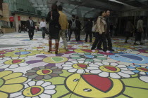 Roppongi Ark Hills. Ark Tower shopping area with Takashi Murakami art on the pavement