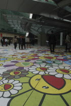 Roppongi Ark Hills. Ark Tower shopping area with Takashi Murakami art on the pavement