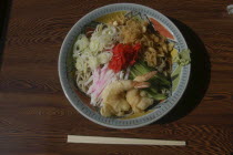 Bowl of " hiyashi tanuki soba" chilled raccoon dog buckwheat noodles  popular summertime meal