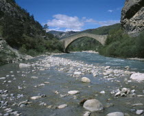 Coulomp River with the Pont de la Reine Jeanne bridge