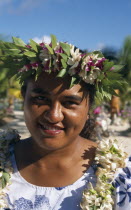 Portrait of a woman wearing a garland