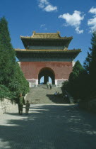 Chinese visitors at gateway to tombsPeking Beijing