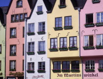 Typical building facades  painted in pastel colours in Cologne fish market