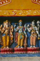 Detail of colourful temple carvings depicting Hindu Gods