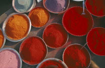 Dishes of colourful Tika paint powder