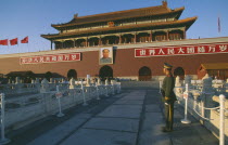 Tiananmen Square. Gate Heavenly Peace with soldier standing in the foregroundPekingPeking