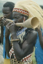 Tutsi musicians playing horns.Watutsi