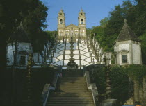 Church east of Braga with baroque stairway with white painted walls lined with statues representing an upward spiritual journey