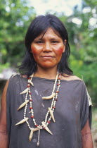 Machiguenga Indian woman wearing beaded necklaces.