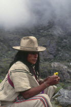 Ica Indian taking coca  gourd in left hand has calcium which is mixed with coca leaves in the mouth.